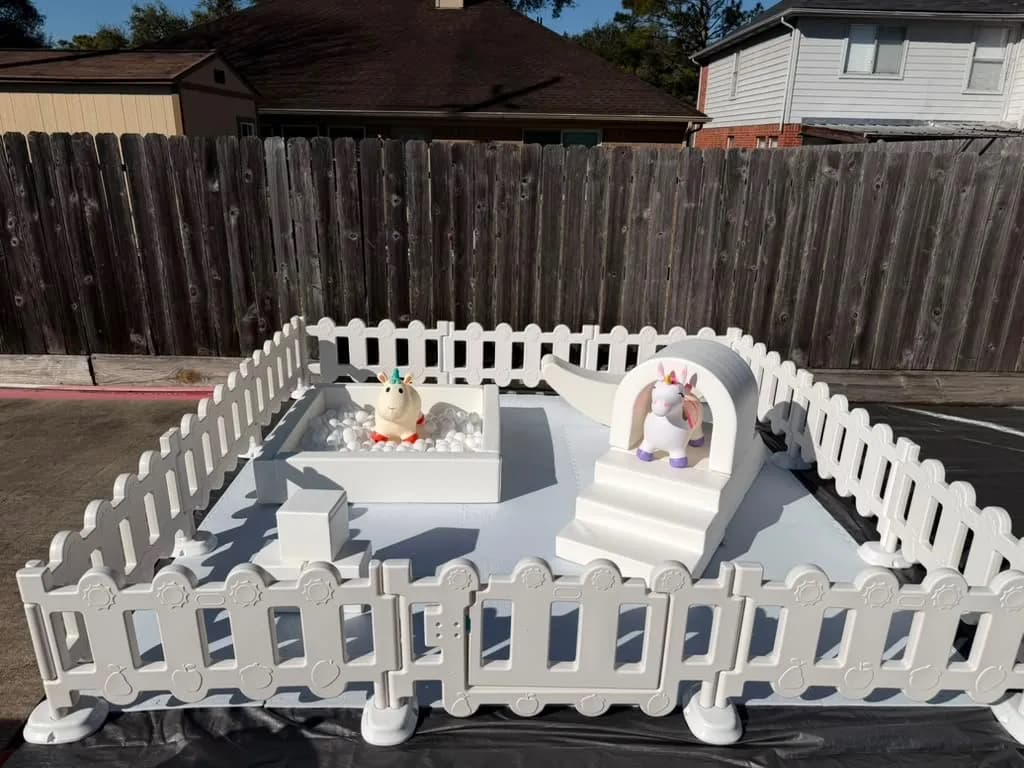 A Kay Little Jumps gated soft play set with a ball pit, slide, and soft rockers